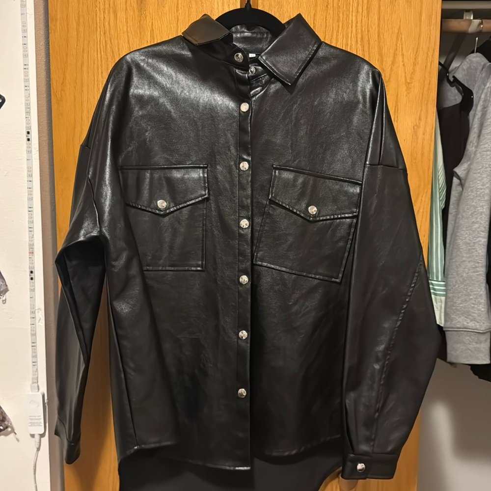 Oversized black leather jacket